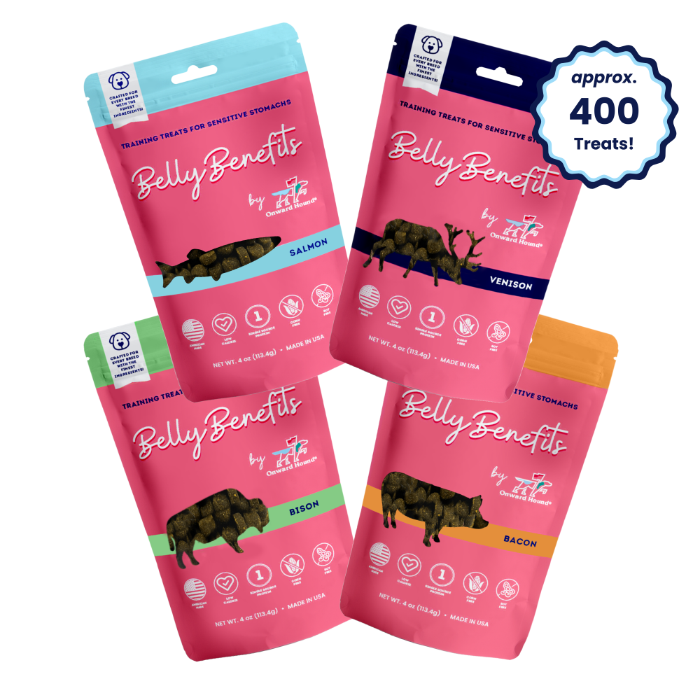 Three packages of Onward Hound Belly Benefits dog treats, each featuring an image of a dog and indicating the treats are for training or rewarding, with a '400' treat limit. The packages are pink with white and green text, and one showcases a 'No Mess' feature.